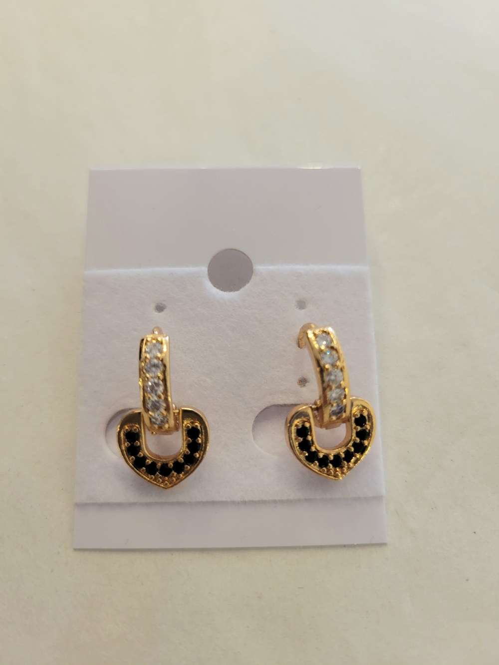 Gold Tone Heart Drop Huggie Earrings with Black and Clear Stones